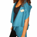 Teal Poncho – “Cultural Muse”