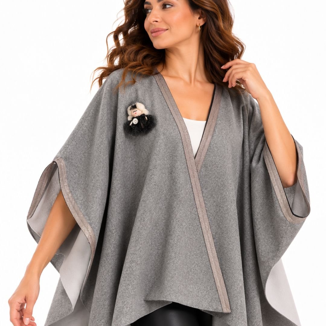 1 Light Grey Poncho Doll - Image 1